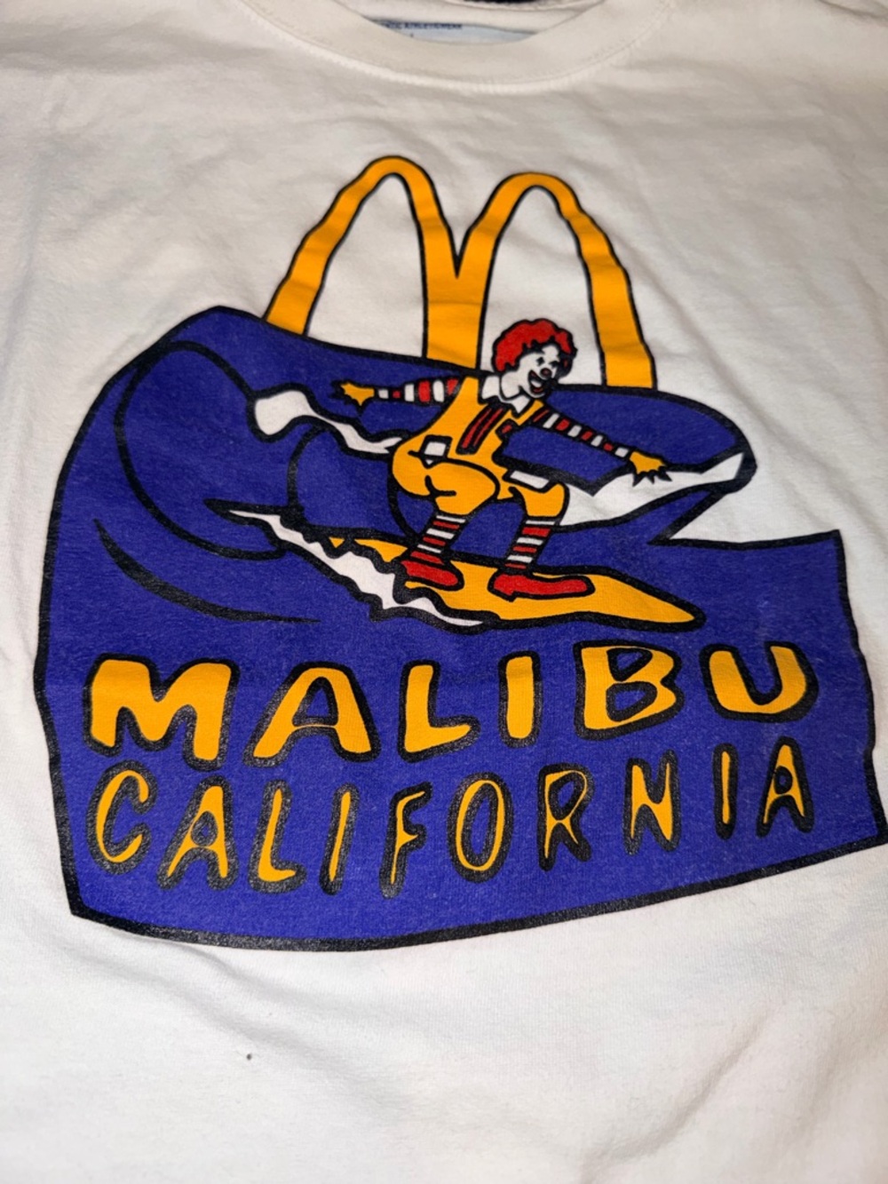 Champion White Short Sleeve Tee with Yellow & Blue Graphic - Men - Picture 2 of 3